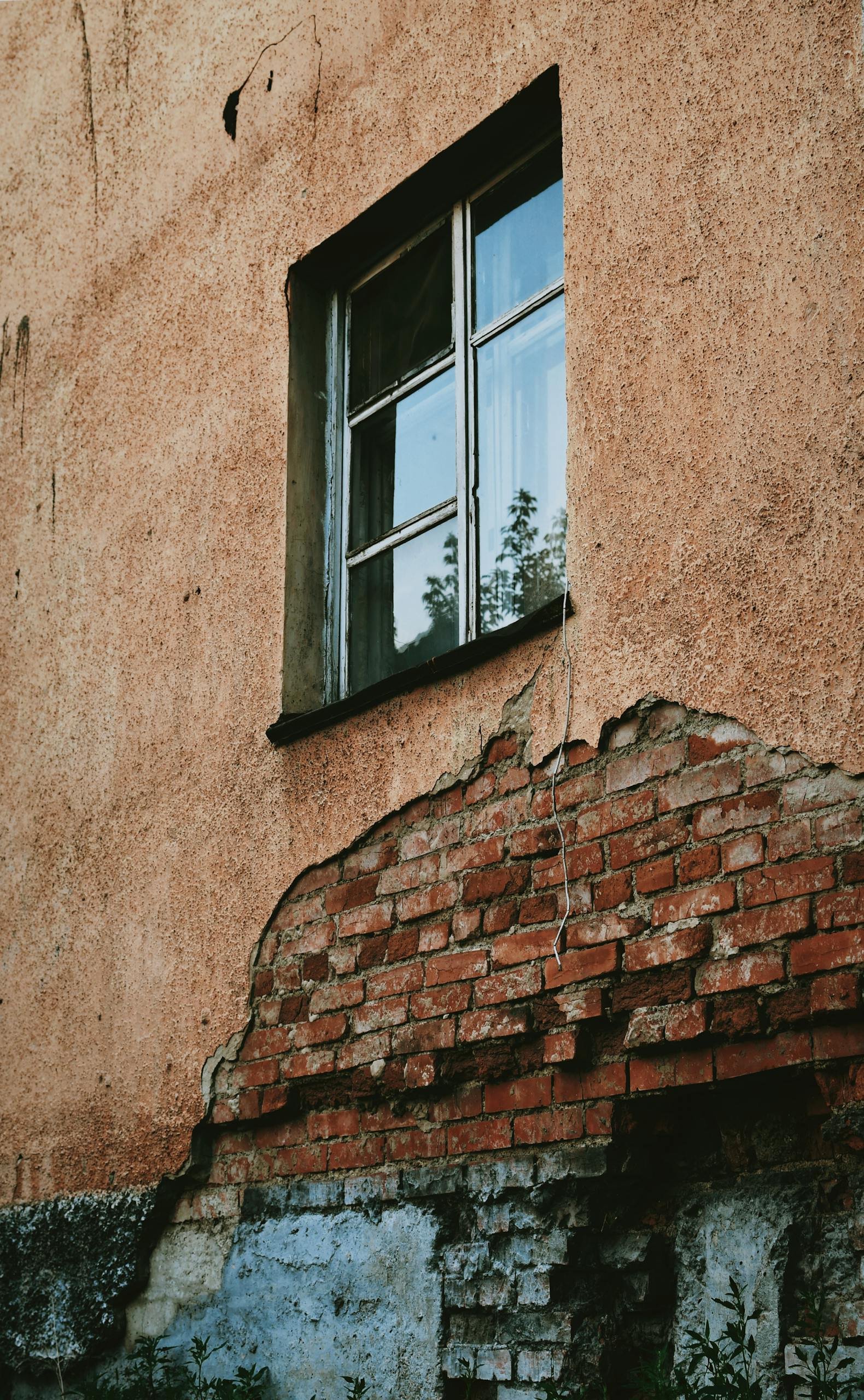 Rustic building facade showing signs of age — foreclosure cleanout and property clearance dumpster rental
